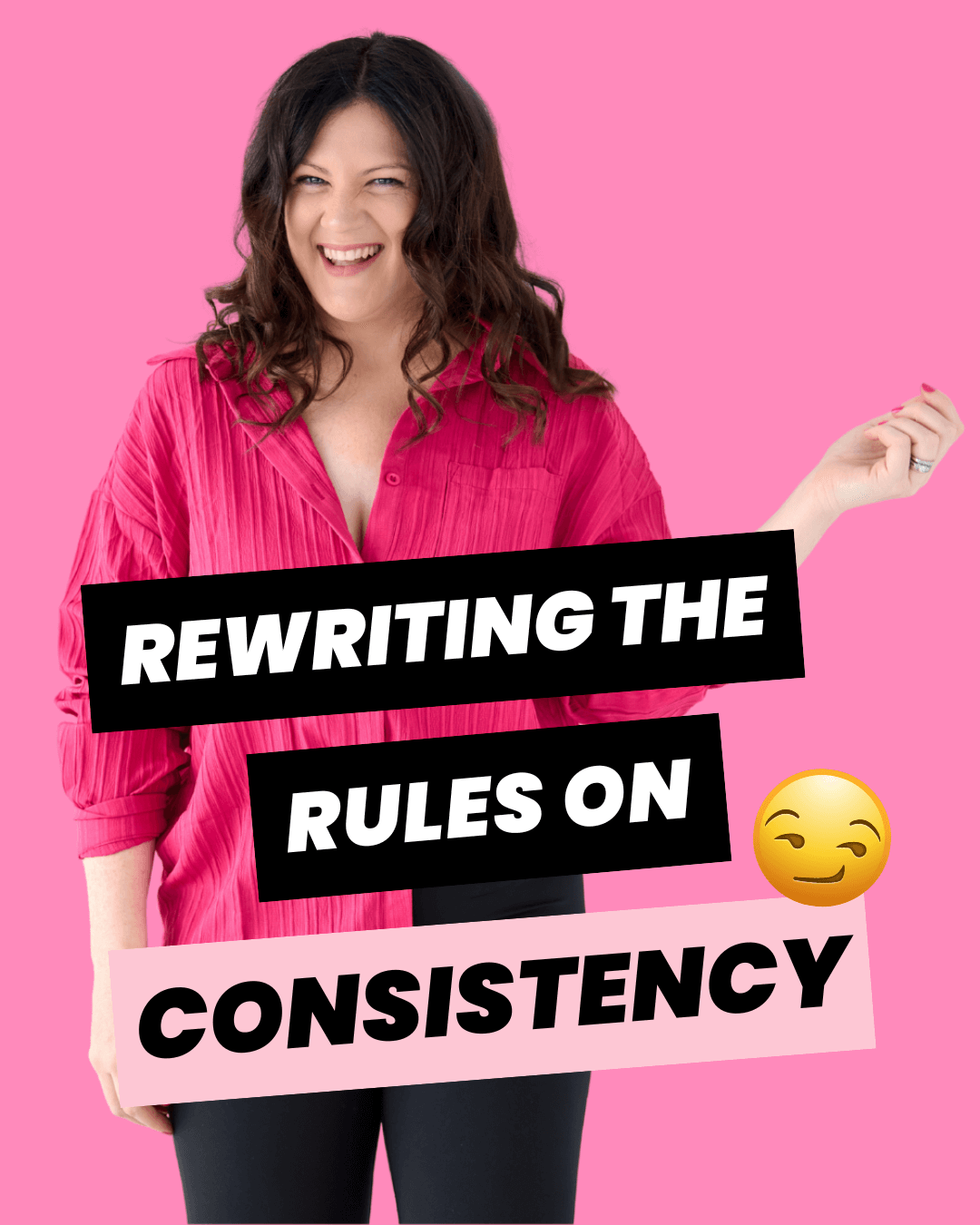 Emily wearing a hot pink button up shirt, smiling at the camera