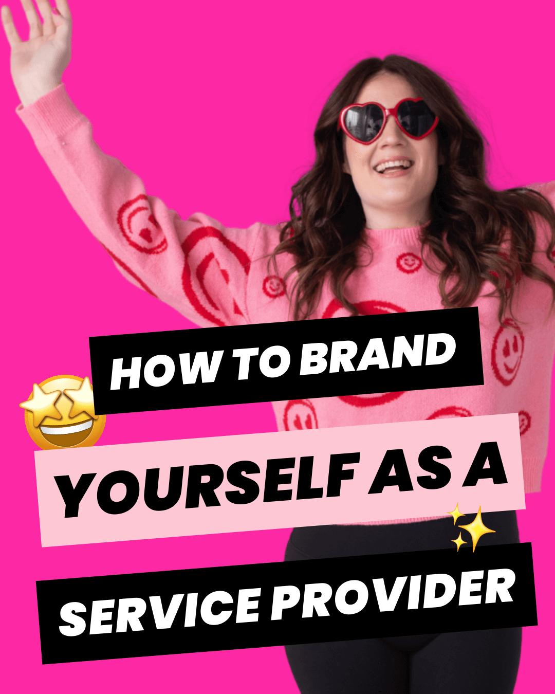 Bold branding designer, Emily Lauren Dick, wearing a pink sweater with red smiley faces and red heart shaped sunglasses