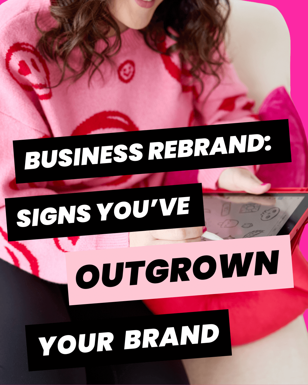 Emily Lauren Dick, Bold Brand Startegist and Designer in a pink shirt with red smiles on it, drawing on her ipad.