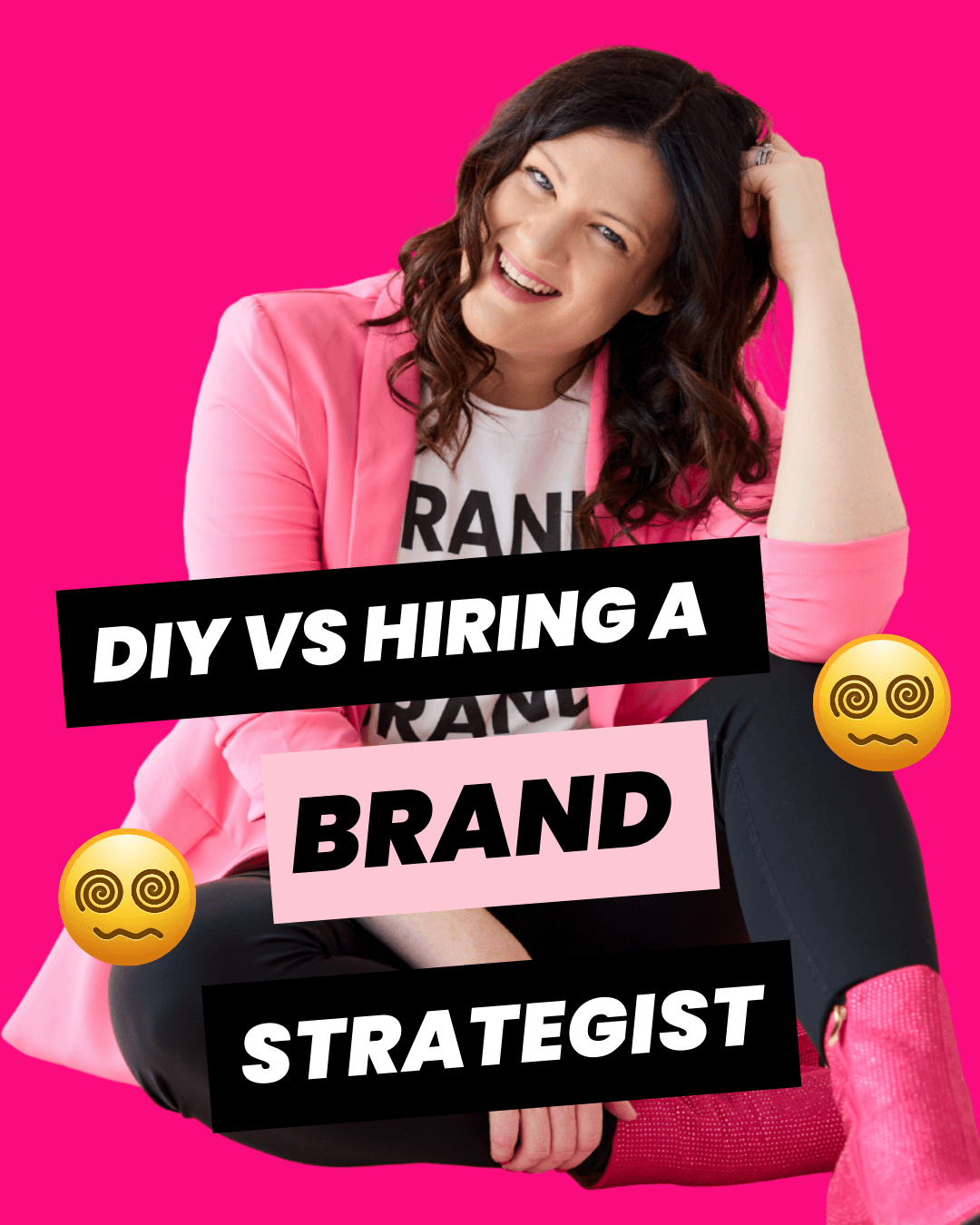 Bold brand strategist, Emily Lauren Dick, sitting and leaning on her hand, smiling and wearing a pink blazer.